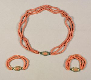 Coral bead child’s necklace and matching armlets, Italy, ca