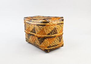 Lottie Stamper, basket with lid, Cherokee, North Carolina, 1946. Rivercane and pigments, 10 5⁄16 × 5 11⁄16 × 5 15⁄16 in. Penn Museum, Philadelphia, 46-6-49A/B