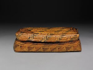Once-known maker, basket, South Carolina, c. 1720s. Rivercane and pigments, 7 1⁄2 × 40 × 16 in. British Museum, London, Am,SLMisc.1218.a-b (Photo: © The Trustees of the British Museum)